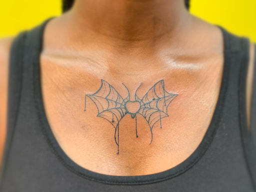 Explore neck tattoo men ideas, creative tattoo ideas in Fairfax, available at Factor Studio Tattoo