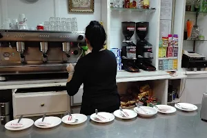 Cafetería churreria Irlandés image