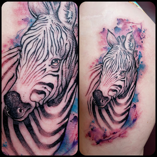 Find playboy bunny tattoo ideas for your next unique tattoo in Fuquay Varina at 401 Tattoo and Antiquities