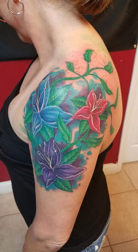 Explore finger lettering tattoo ideas, creative tattoo ideas in Ocoee, available at Slaughterized Ink Tattoo and Piercing Studio