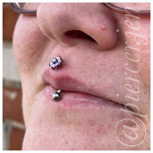 Explore under chin tattoo ideas, creative tattoo ideas in Muskogee, available at Spurlocks Emporium