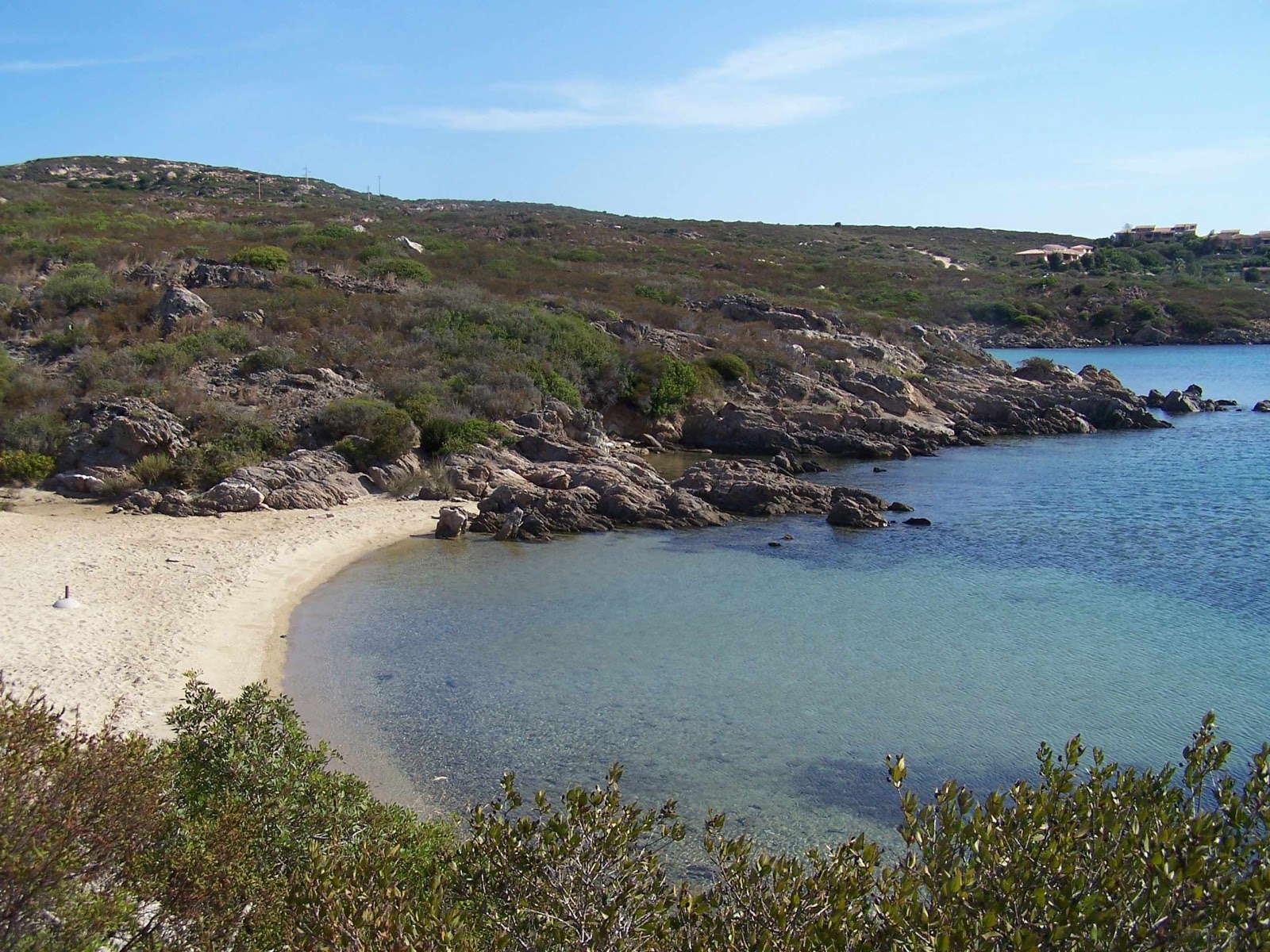 Valokuva Caletta di Lu Pianuista. pinnalla beige iekka:n kanssa