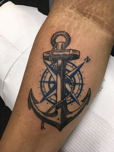 Explore scuba diving tattoo ideas, creative tattoo ideas in Charlotte, available at Crown Custom Tattoo Studios