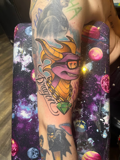 Explore cartoon tattoo ideas for men, creative tattoo ideas in Jonesboro, available at Gallery Of Ink Tattoo Shop