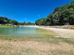 Plage de Loisirs de Saint-Clar'in fotoğrafı düz bir kıyı şeridi ile birlikte