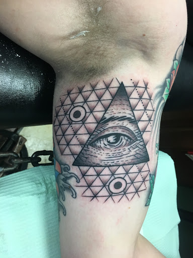 Explore tattoo background shading ideas, creative tattoo ideas in Erie, available at Wayward Tattoo Studio