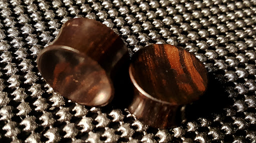 Explore live love laugh tattoo ideas, creative tattoo ideas in Dover, available at TATTOO MAFIA, INC.