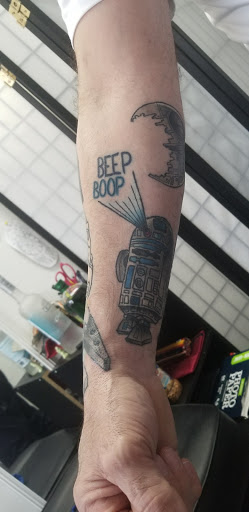 Explore rose tattoo idea, creative tattoo ideas in Reading, available at Inked In 2 Tattoo & Piercing Studio