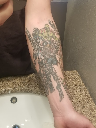 Explore full arm sleeve tattoo ideas for men, creative tattoo ideas in Sioux City, available at Tattoo Monkey