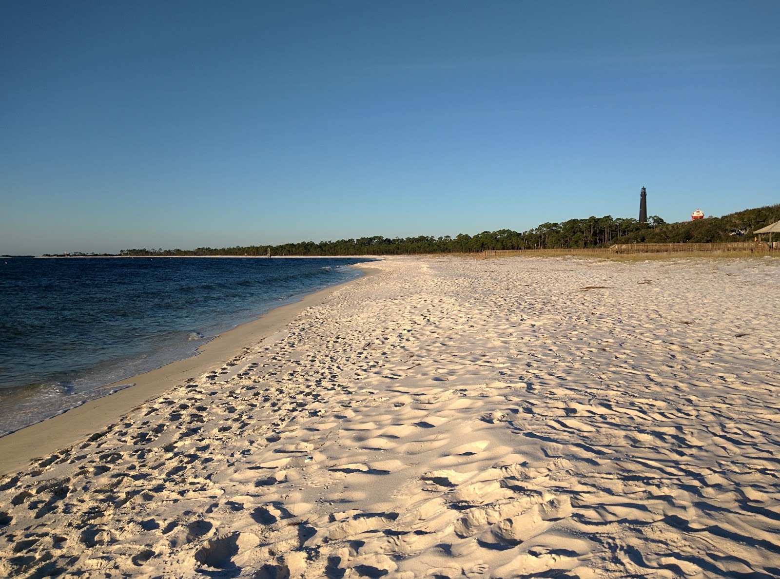 Foto di San Carlos Beach con una superficie del sabbia bianca fine