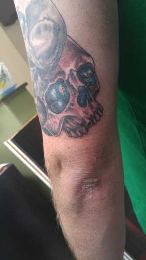 Explore neck tattoo ideas for women, creative tattoo ideas in Eugene, available at High Priestess Piercing & Tattoo