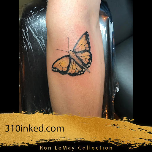 Explore fishing tattoo ideas for guys, creative tattoo ideas in Spokane, available at Ron LeMay Tattoo