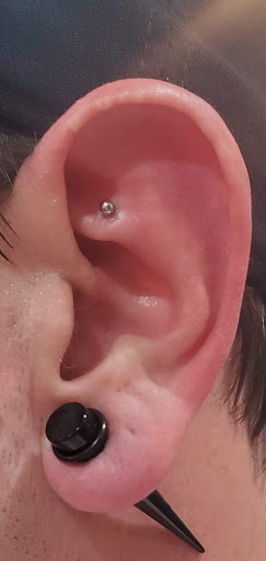 Explore aquarius tattoo ideas for men, creative tattoo ideas in Myrtle Beach, available at Pitbull Tattoo and Piercing Clinic