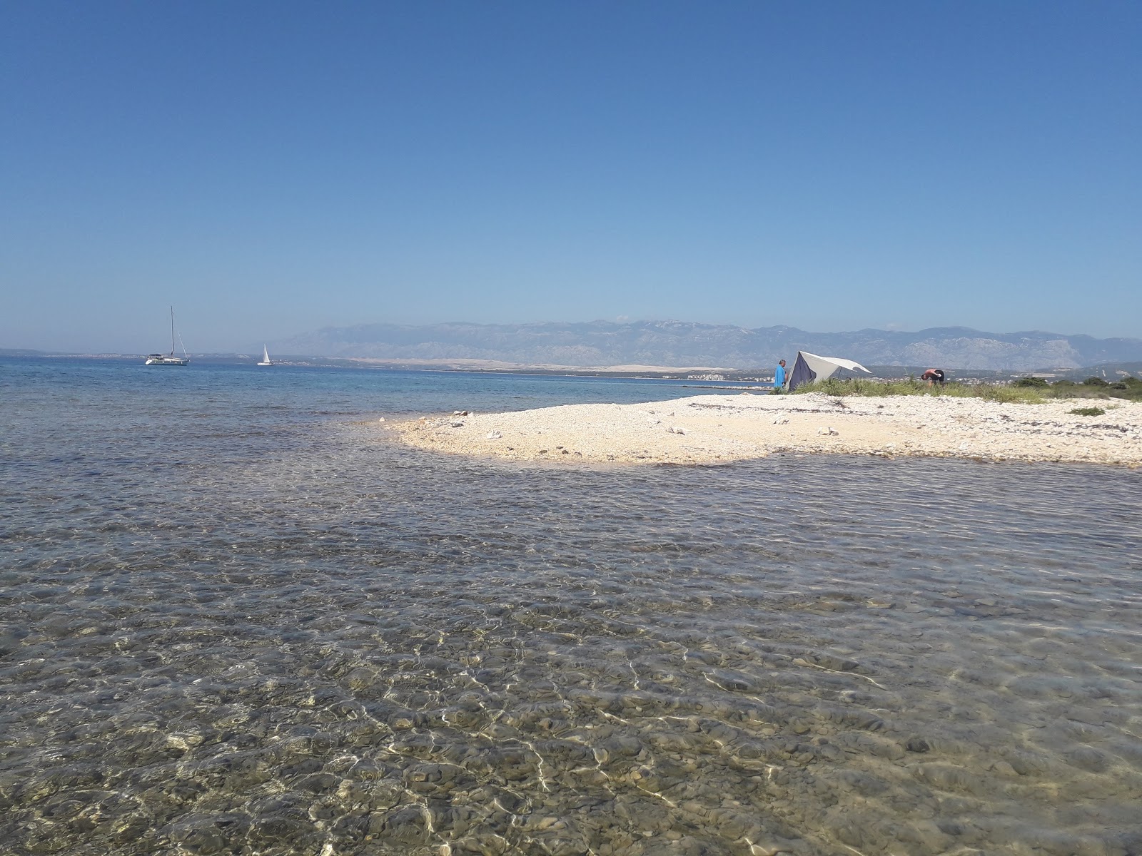 Foto von Maun beach mit teilweise sauber Sauberkeitsgrad