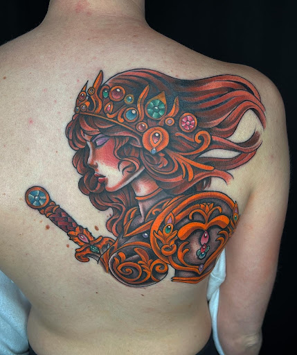 Explore mid arm tattoo ideas, creative tattoo ideas in Matthews, available at Divine Arts Tattoo Company