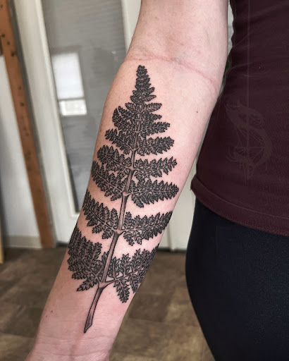 Explore ideas for ring tattoos, creative tattoo ideas in Lopez Island, available at Soot and Bone Body Art Studio