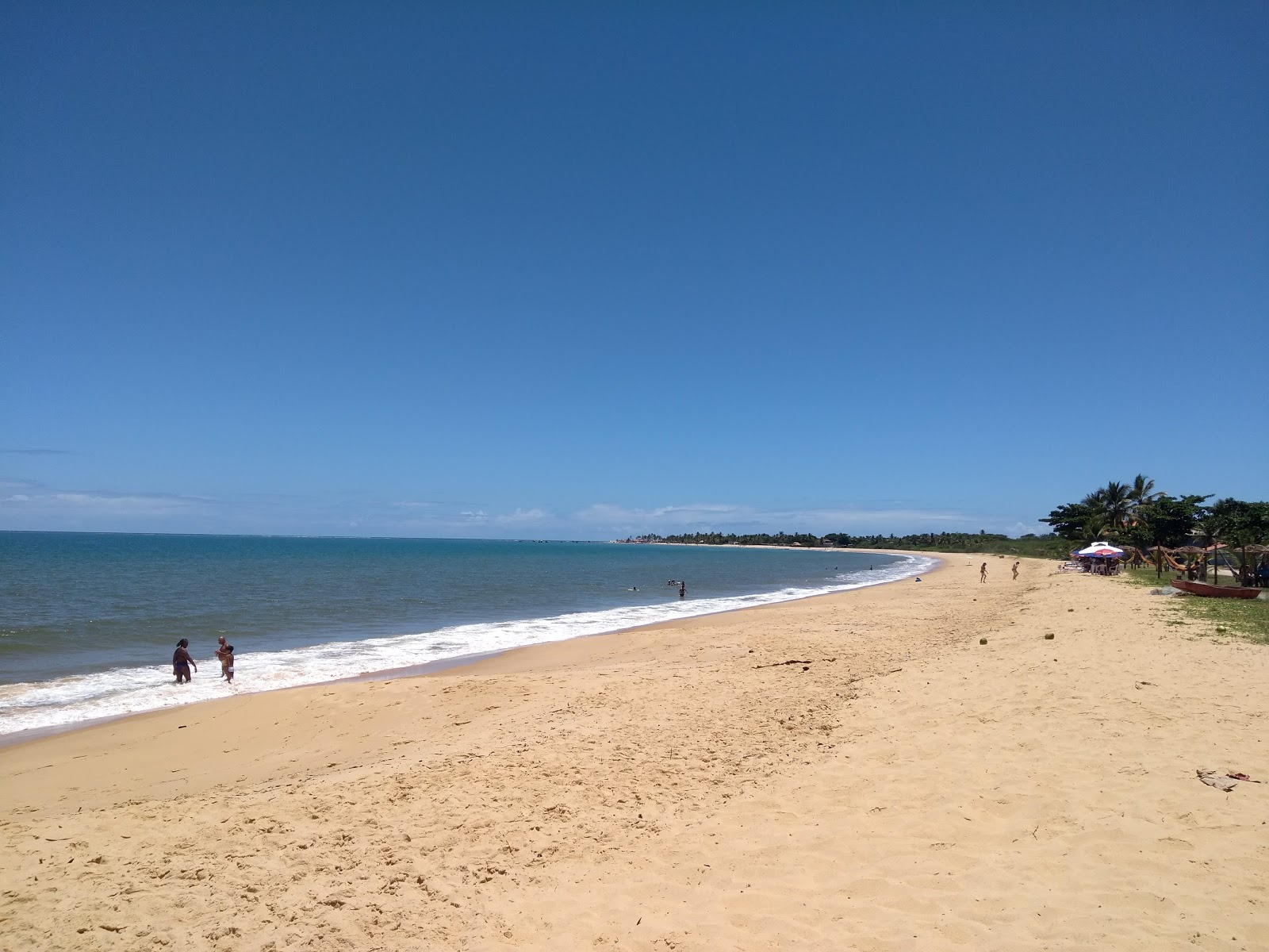 Foto von Praia de Lencois mit feiner beiger sand Oberfläche
