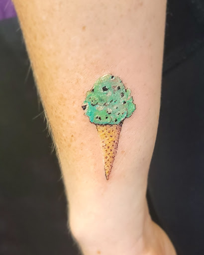 Explore dog and cat tattoo ideas, creative tattoo ideas in Sarasota, available at Z-Edge Tattoo and Body Piercing North Shop