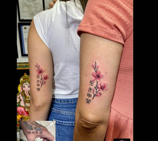 Explore book dragon tattoo ideas, creative tattoo ideas in Ambler, available at Tattoo GalaxyAmbler Piercing & Custom Tattoos