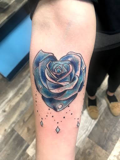 Explore back of the arm tattoo ideas, creative tattoo ideas in Frankfort, available at The Reef Tattoo