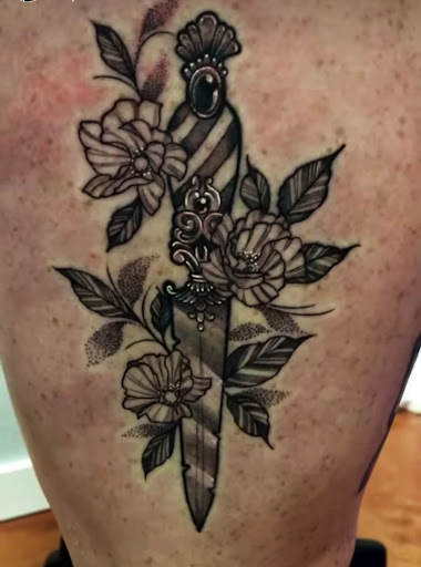 Explore cover up tattoo ideas on arm, creative tattoo ideas in Aledo, available at Elevated Tattoo & Piercing