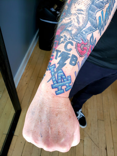 Find tattoos ideas on leg for your next unique tattoo in Traverse City at Black Candle Tattoo Co.