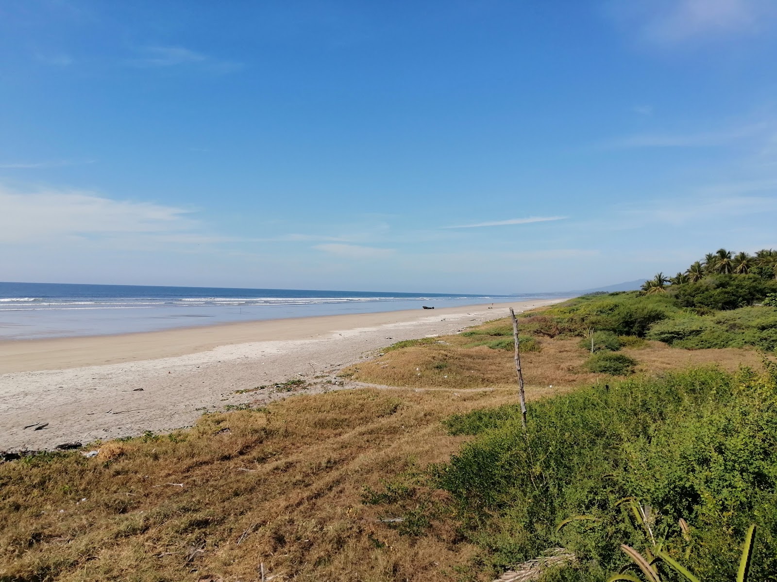 Foto av Icacal beach med lång rak strand