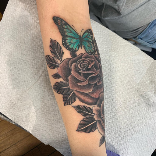 Explore skull hand tattoo ideas, creative tattoo ideas in Greensboro, available at Opalus Tattoo