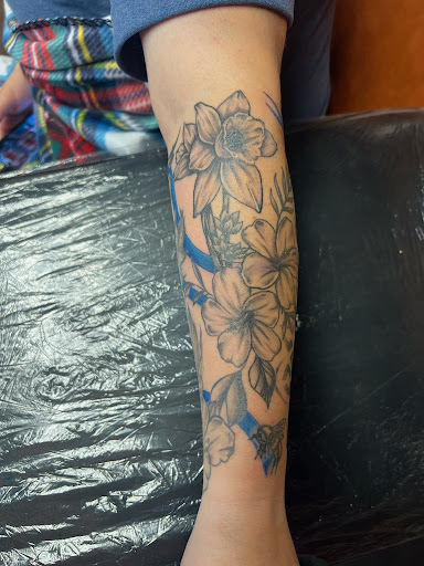 Explore cat paw print tattoo ideas, creative tattoo ideas in Green Cove Springs, available at Under Your Skin Tattoos