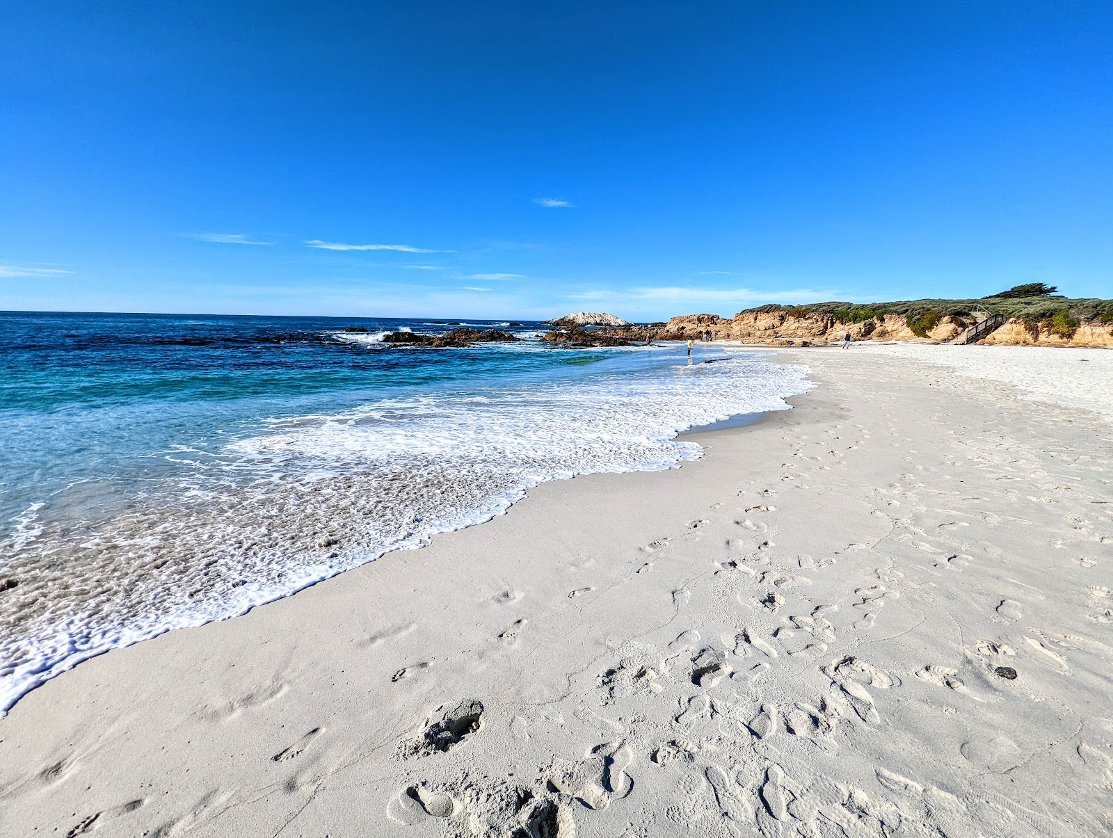 Foto di Seal Rock Beach con una superficie del sabbia bianca