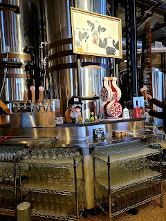 A pint of beer on a bar