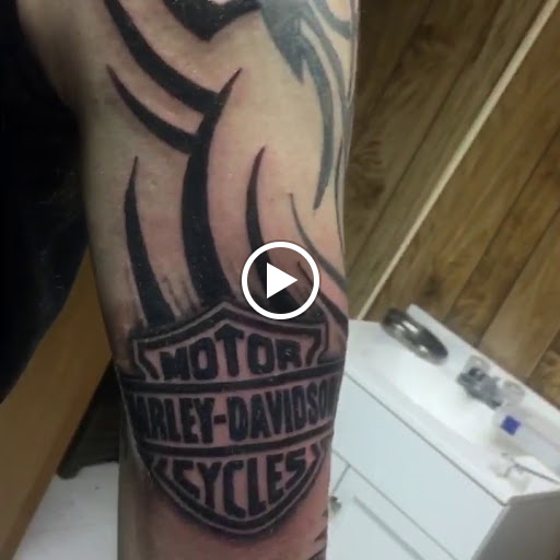 Explore cool arm tattoo ideas for guys, creative tattoo ideas in Centre, available at Leftys