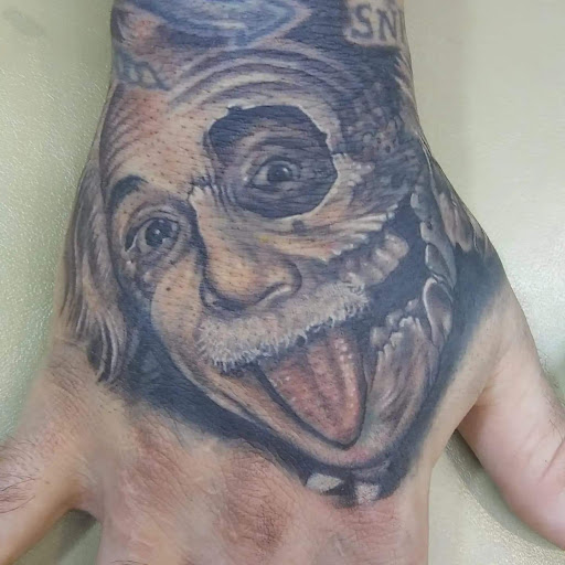 Explore tattoo ideas for biceps, creative tattoo ideas in Pahoa, available at Electric Jungle Tattoo