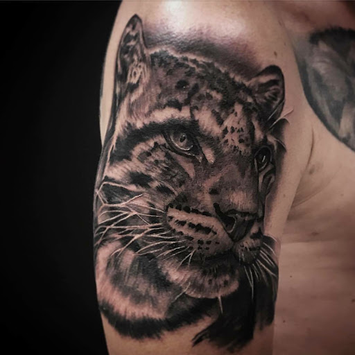 Explore wednesday addams tattoo ideas, creative tattoo ideas in Arlington, available at Urbans Tattoo & Piercing Studio