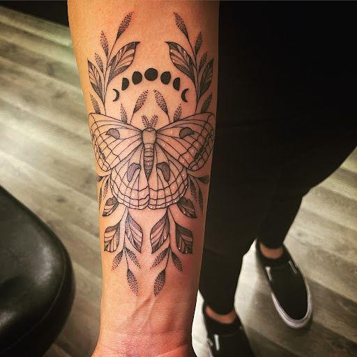 Explore top gun tattoo ideas, creative tattoo ideas in Stevens Point, available at International Ink Tattoos