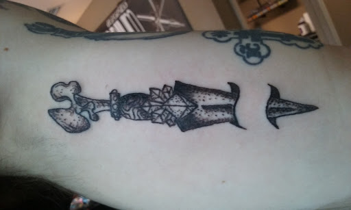 Explore mother and child tattoo ideas, creative tattoo ideas in Lakeland, available at The Emporium Lakeland