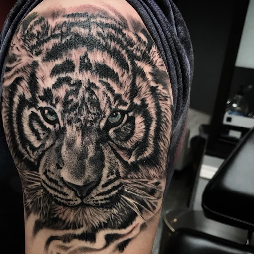 Explore tattoo ideas running, creative tattoo ideas in Arlington, available at Urbans Tattoo & Piercing Studio