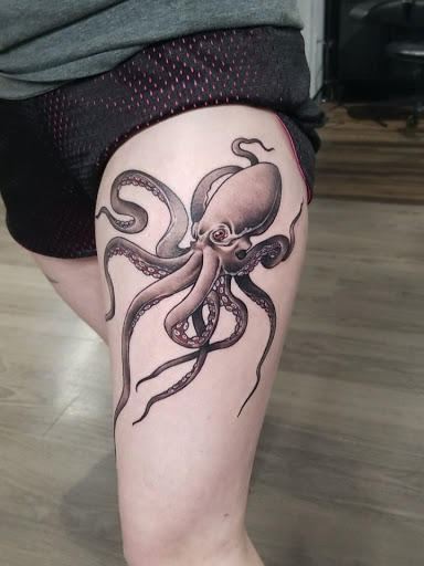 Find planet tattoo ideas for your next unique tattoo in Little Rock at High Regard Tattoo