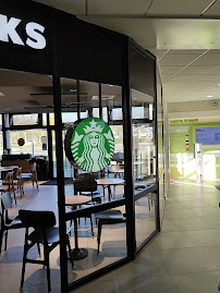 Atmosphère du Café Starbucks Coffee - Autogrill. Porte de la Drôme A49 à La Baume-d'Hostun - n°12