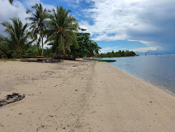 Foto von Mamangku Mas Mas mit lange, gerade küste