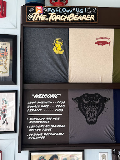 Explore money bag tattoo ideas, creative tattoo ideas in Providence, available at The Torchbearer Tattoo