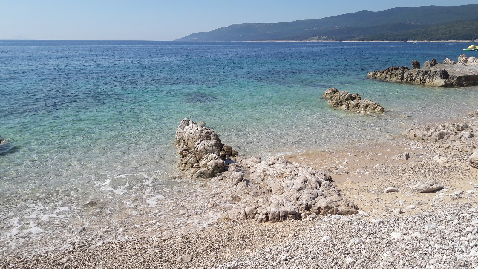 Fotografija Girandella beach z turkizna čista voda površino