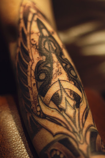 Explore rapper tattoos ideas, creative tattoo ideas in Hudson, available at The Bohemian Social Club