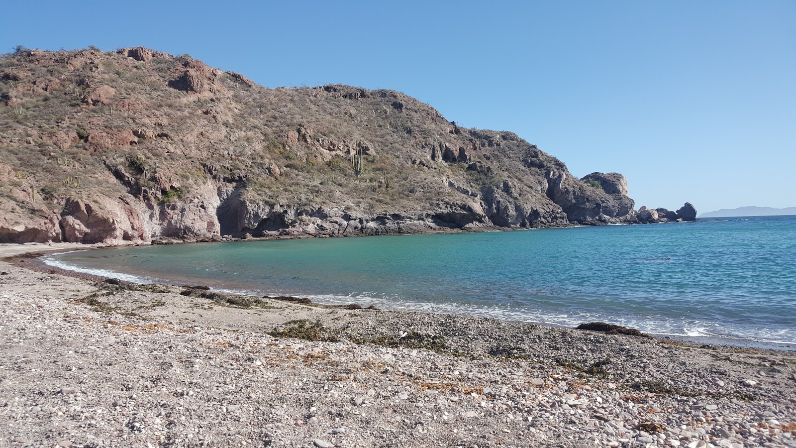 Fotografija La Venencia beach z turkizna voda površino