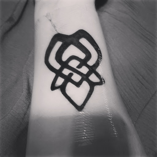 Explore black tattoo cover up ideas, creative tattoo ideas in Fontana, available at Iconiq Tattoo Studio