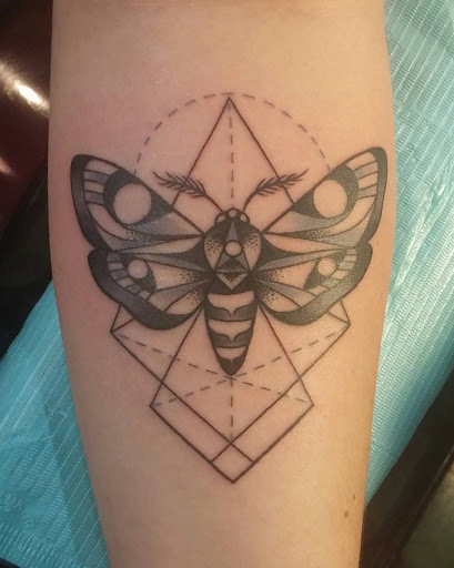 Explore angel tattoo ideas, creative tattoo ideas in Buffalo, available at Arboreal Ink - Tattoo and Piercing