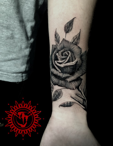 Explore horseshoe tattoo ideas, creative tattoo ideas in Coral Springs, available at Salvation Tattoo Lounge Coral Springs