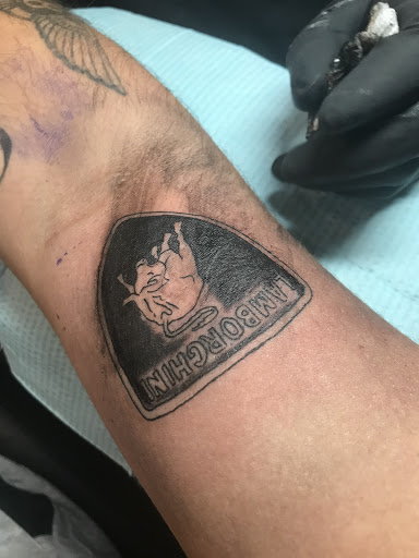 Explore simple flower tattoo ideas, creative tattoo ideas in Miami, available at Green Machine Tattoos & Body Piercing