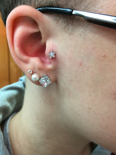 Explore crystal ball tattoo ideas, creative tattoo ideas in Hampton, available at Blue Horseshoe Tattoo and Body Piercing