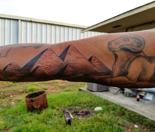 Explore tattoo ideas for men lower arm, creative tattoo ideas in Leesville, available at Bad Apple Tattoo Studio